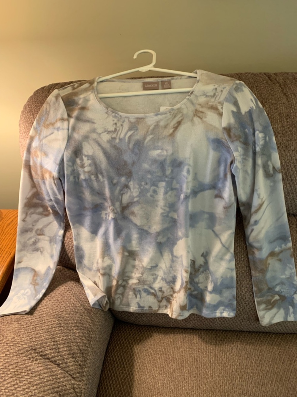 Chicos size 0 long sleeved top.  Beautiful blue, tan and white abstract print.